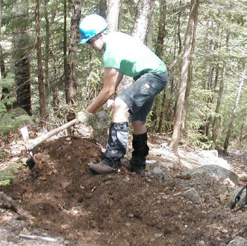 Lev cleans one of 30+ water bars on Square Ledge Trail