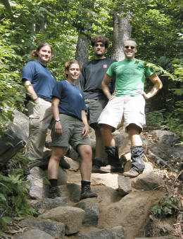 Jenny, Emma, Jeff, and Lev pose on their masterpiece.